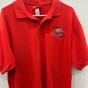 Vintage world of Coca-Cola polo. Dated 1997 . Size Large.